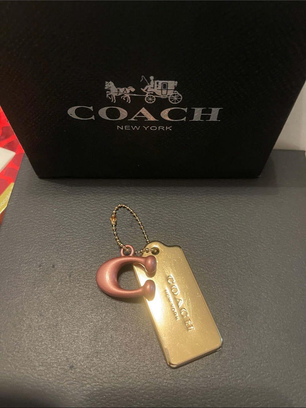 Coach Gold Tag Keychain with Rose Accent